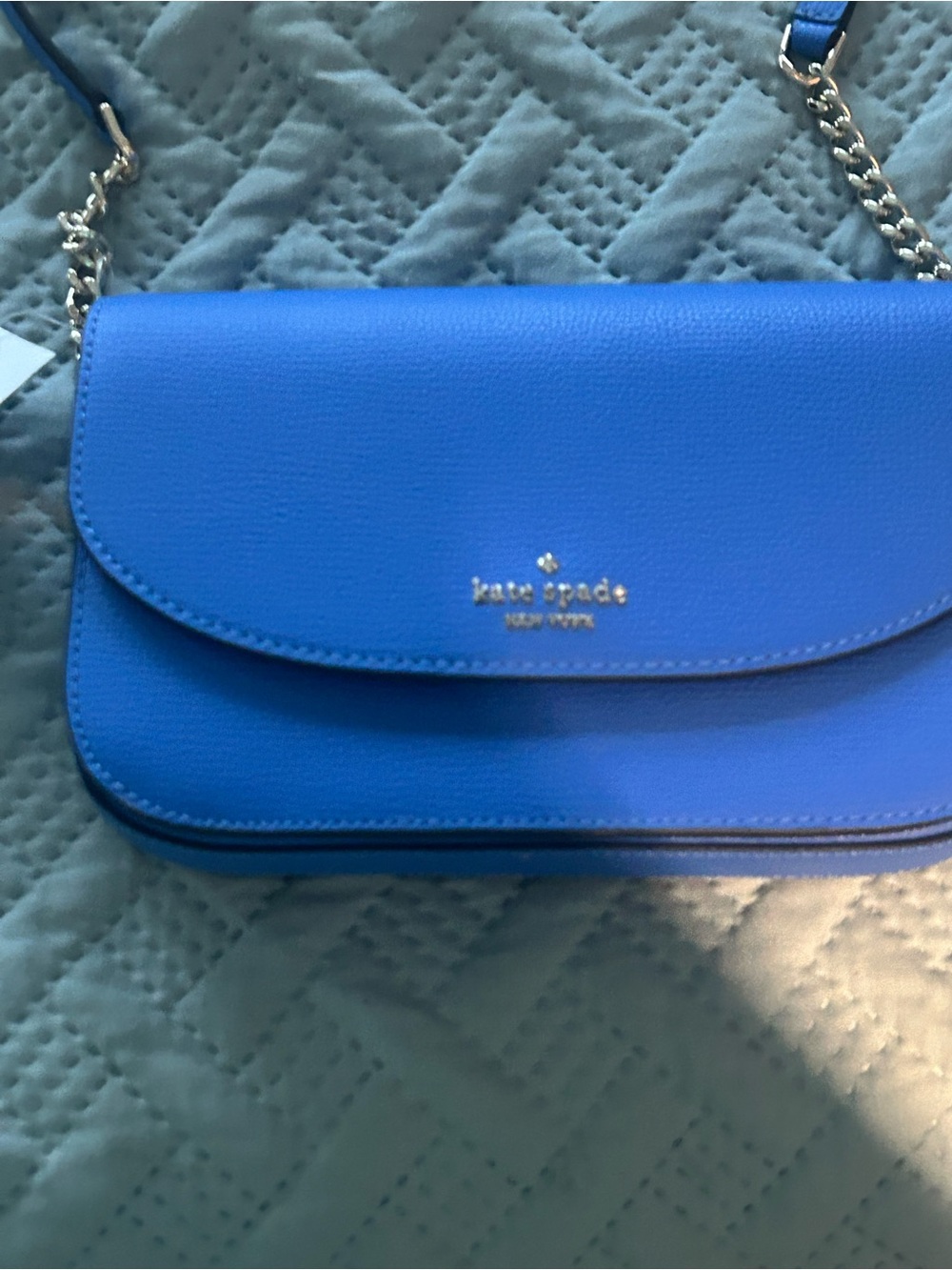 kate spade cobalt blue leather crossbody with silver chain. Brand New with tags